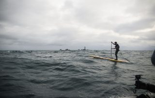 Ben Fisher passing the Longships Lighthouse on The Celtic Crossing