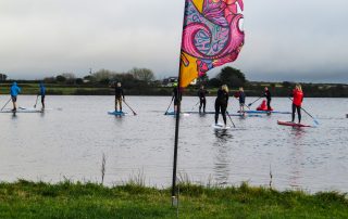 Brass Monkeys Paddleboard and SUP Race start at Stithians Lake